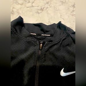 Light weight Dri-Fit Nike Running Jacket.